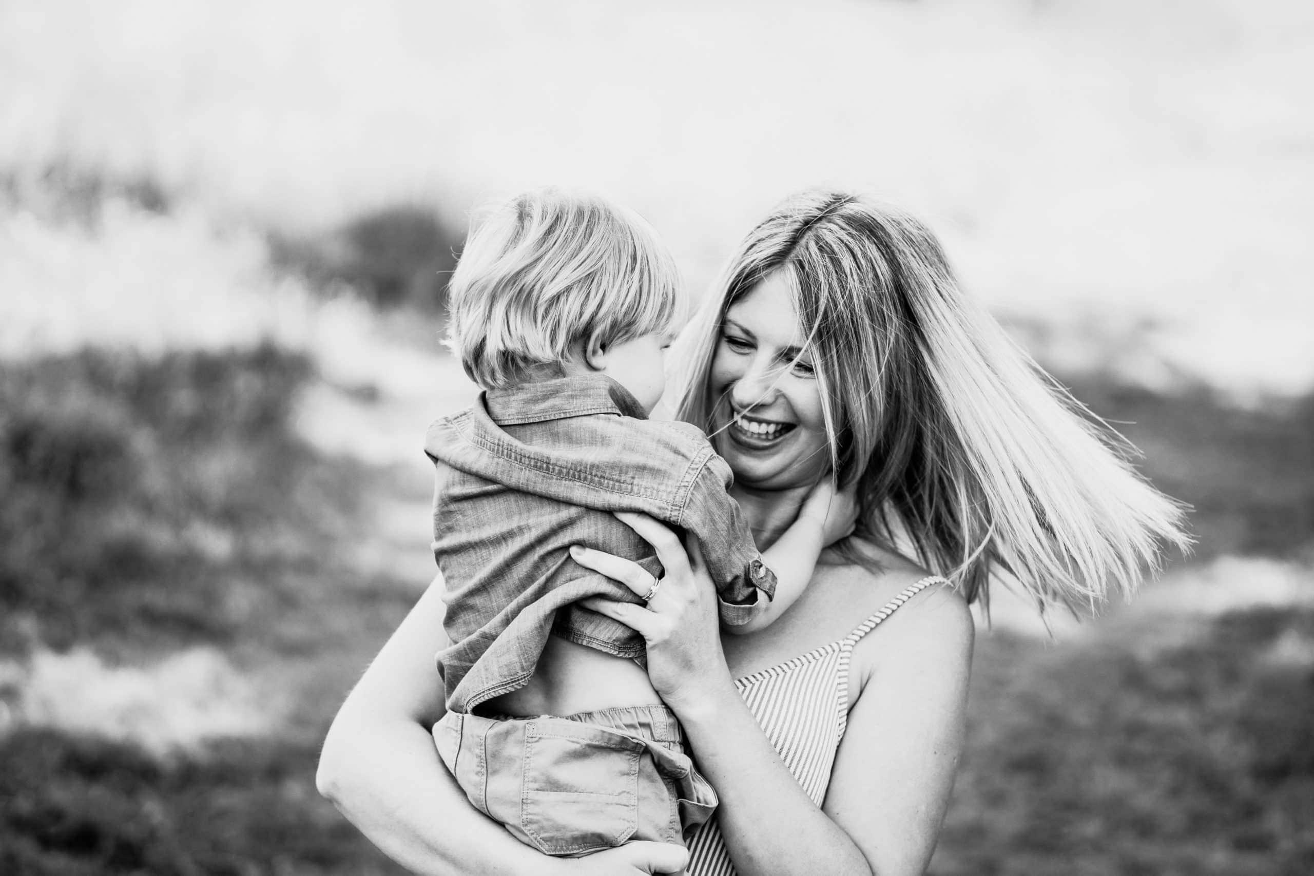 Mum dances with son during session with Norwich Family Photographer
